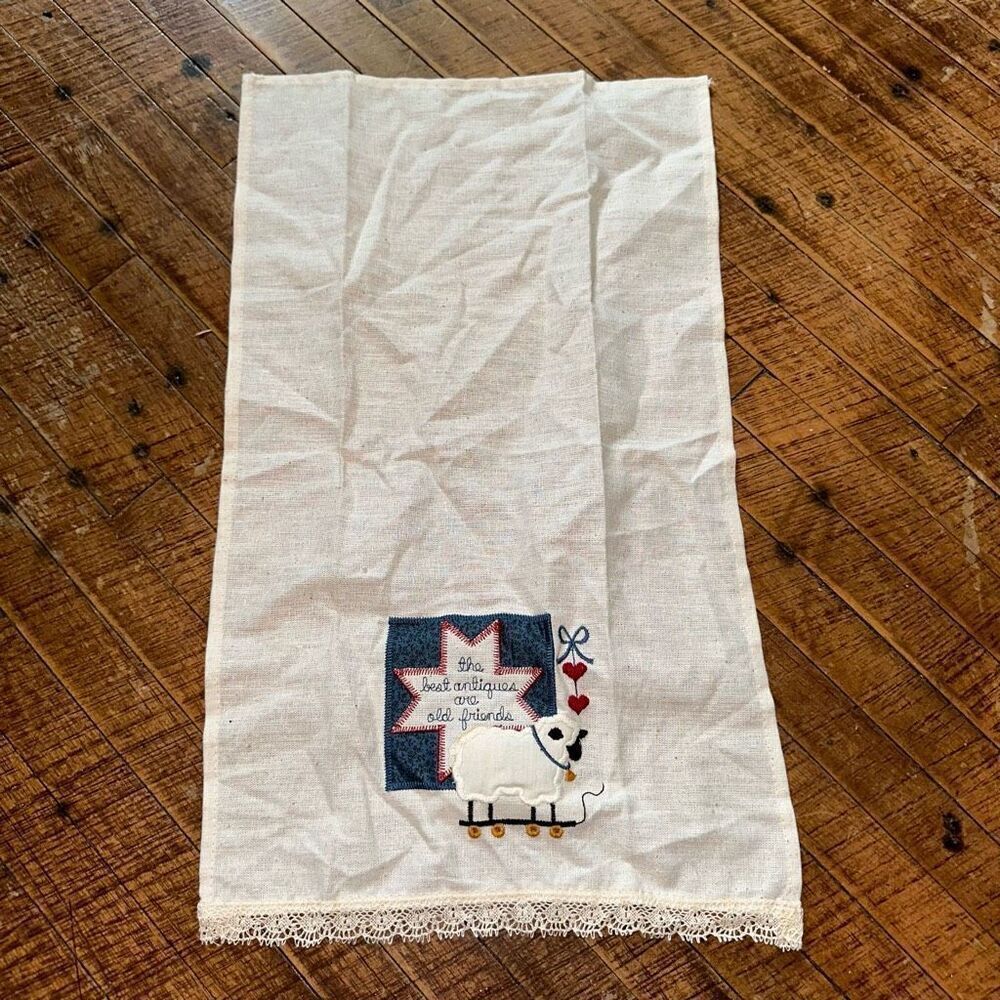 Handmade cross-stitched the Best Antiques are Old Friends tea towel
